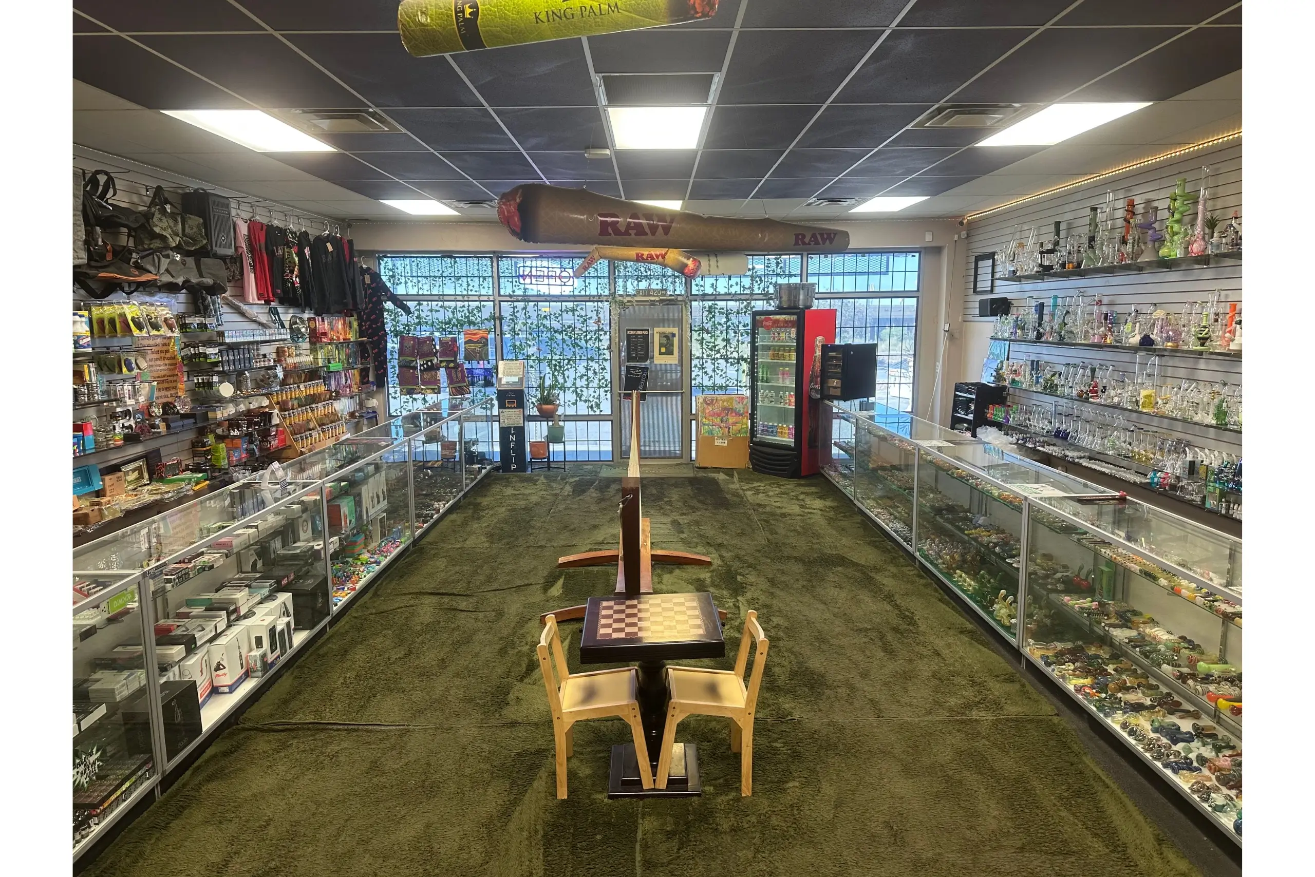 Wide view of El Paso Vape Shop showcasing devices, water pipes, and accessories.